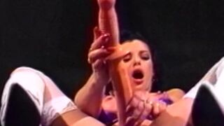 Gorgeous lesbian strips down and impales her pussy and ass